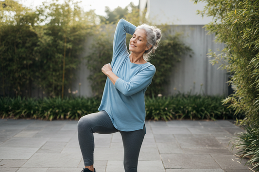 Older active adult stretching outdoors, calm and focused in natural light